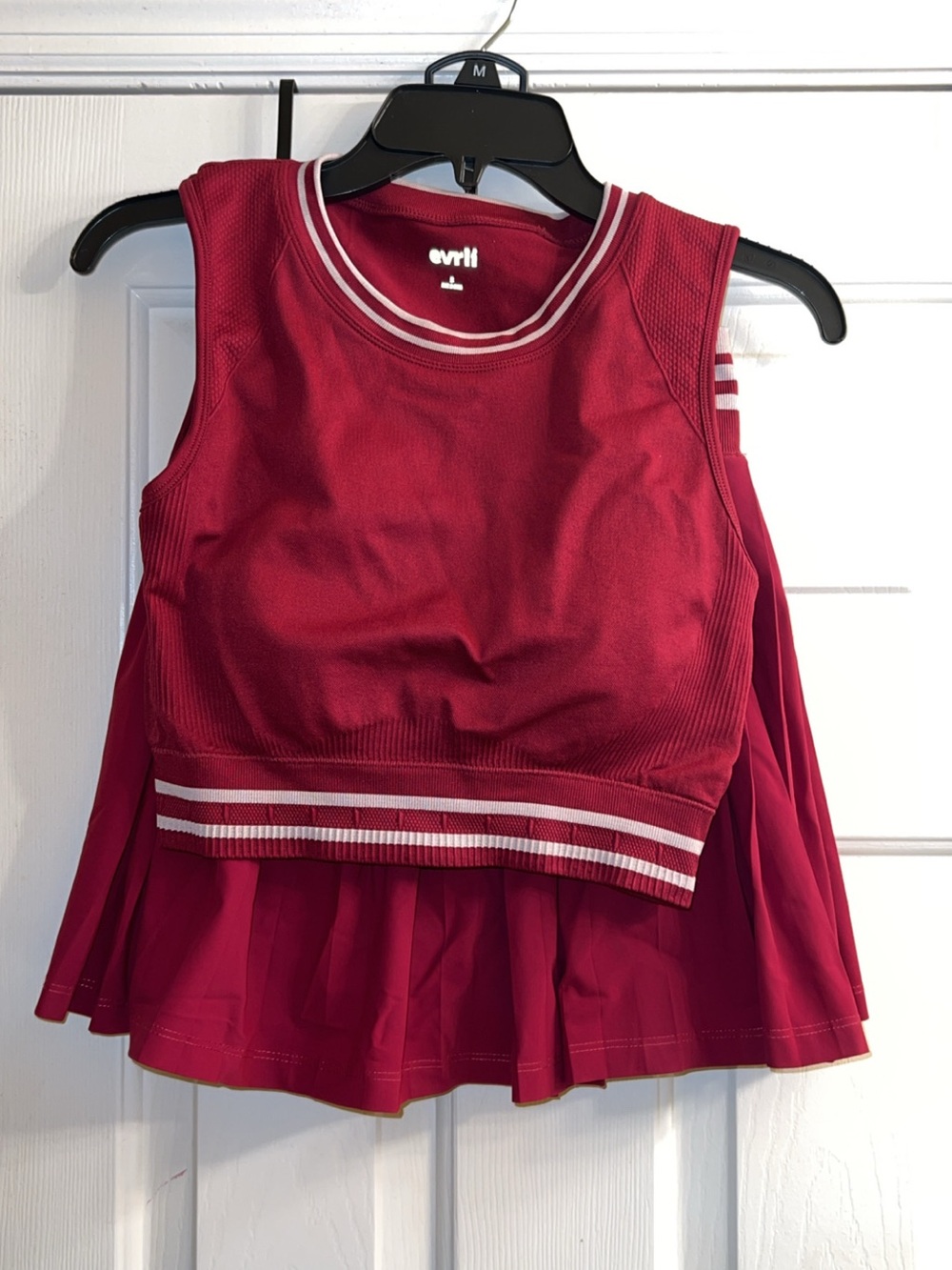 Burgundy and white two-piece athletic crop top and pleated tennis skirt set